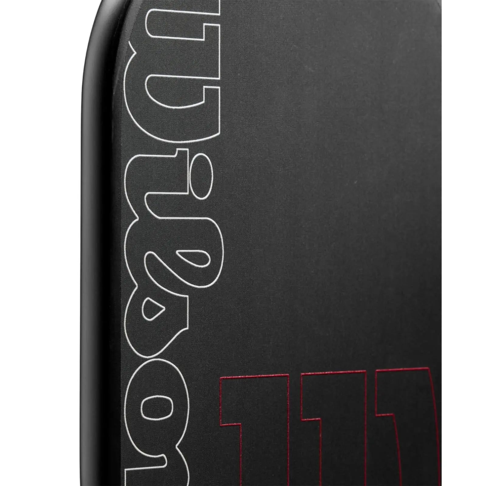 Close-up of the black Wilson Blaze Edgeless 13 pickleball paddle with white "Wilson" and red "13" logos.