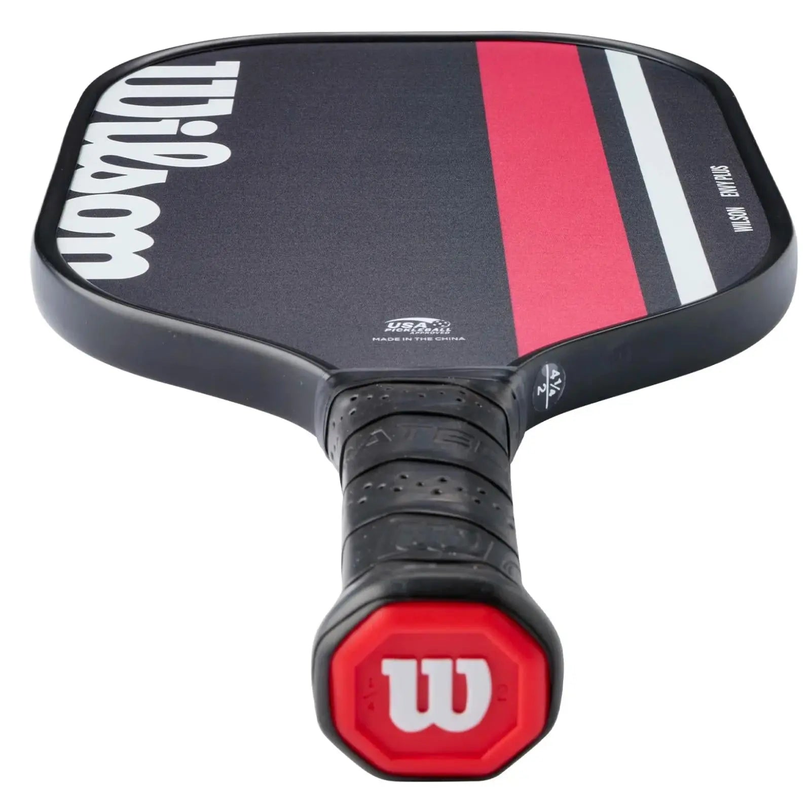 Black Wilson Envy Plus pickleball paddle with red and white stripes, a black grip, and red "W" logo.