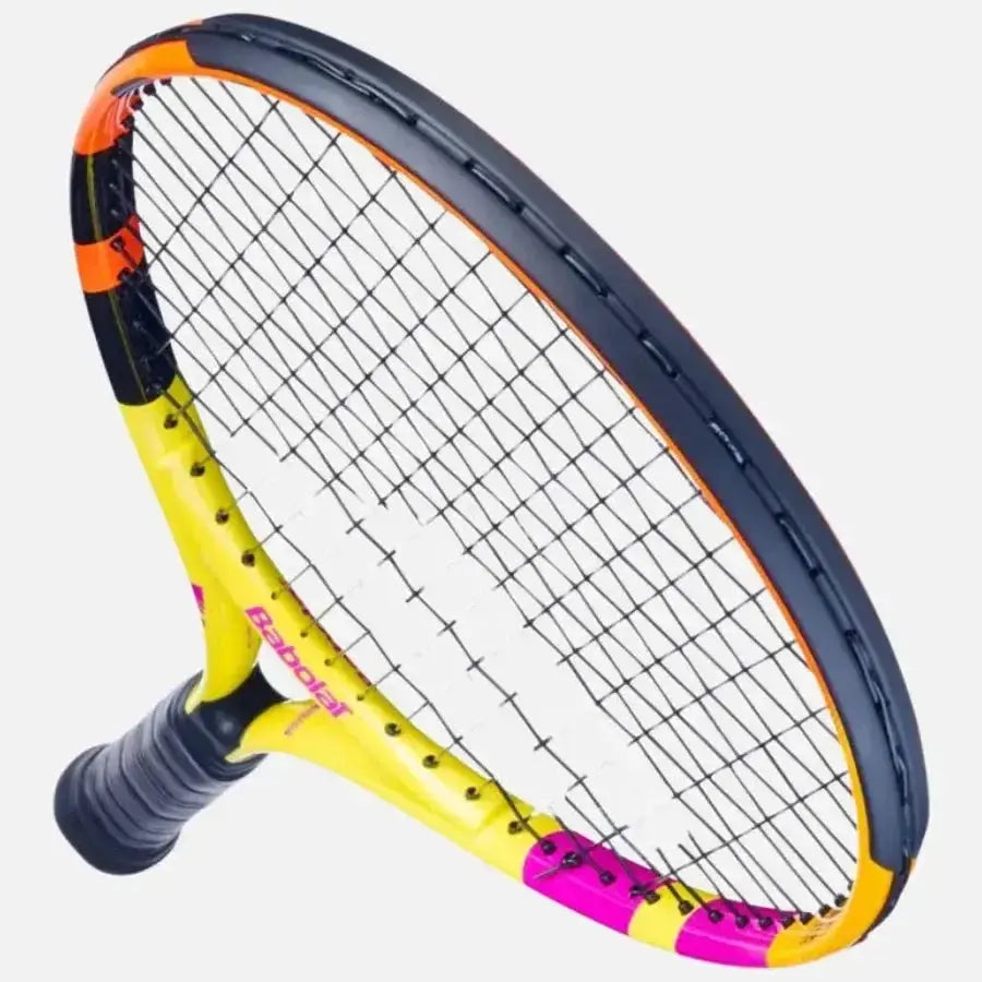 Babolat Nadal Junior 21 tennis racquet, yellow, orange, and pink with black grip and strings.