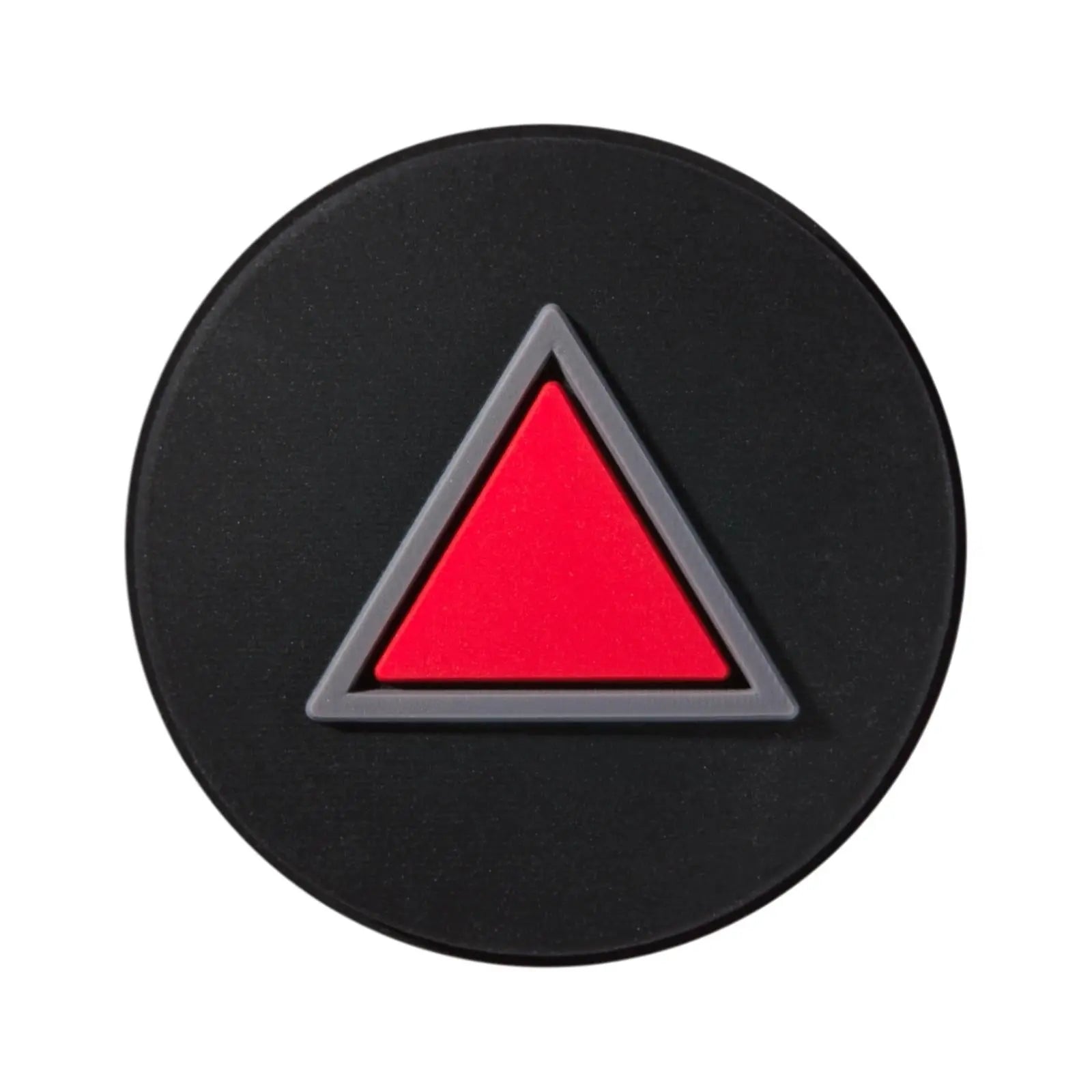 Black circular tennis dampener with a red triangle outlined in gray.