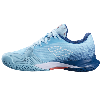 Babolat Jet Mach 3 JR junior tennis shoe, light blue with dark blue heel, white logo, and orange sole accent.
