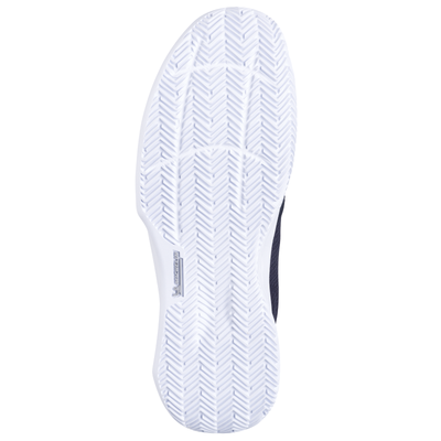 White Michelin rubber outsole of a Babolat SFX Evo clay court tennis shoe, showing herringbone tread.