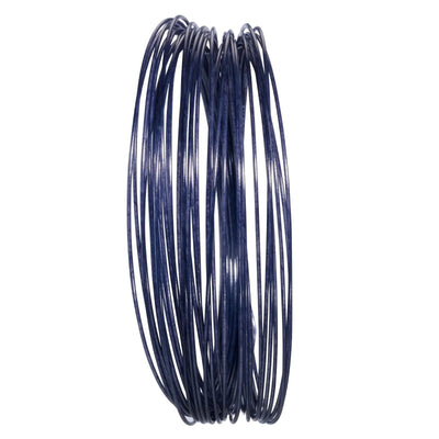 Coiled black Babolat Touch VS 1.30 natural gut tennis string for premium comfort and power.