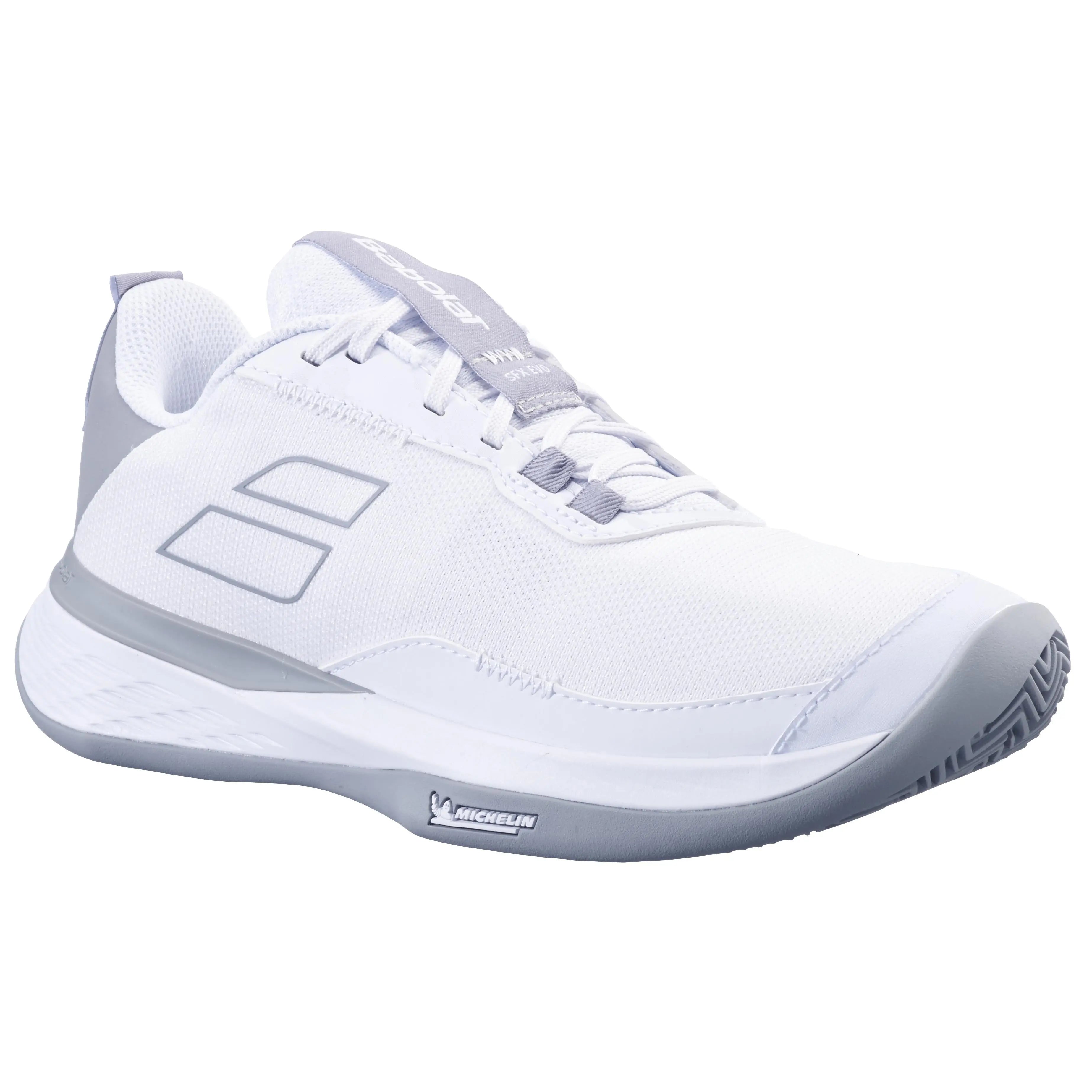 White Babolat SFX Evo women's clay court tennis shoe with grey accents, mesh upper, and Michelin sole.