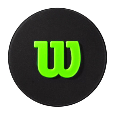 Black circular Wilson Pro Feel Blade dampener with a vibrant green "W" logo.