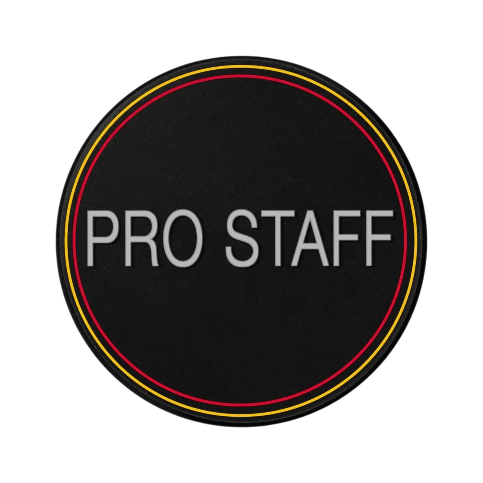 Black oval Wilson Pro Staff dampener with red and yellow trim, "PRO STAFF" in white text.