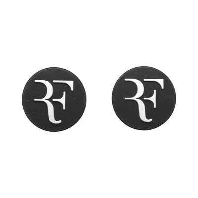 Two round black silicone Wilson RF tennis dampeners with white RF logo.