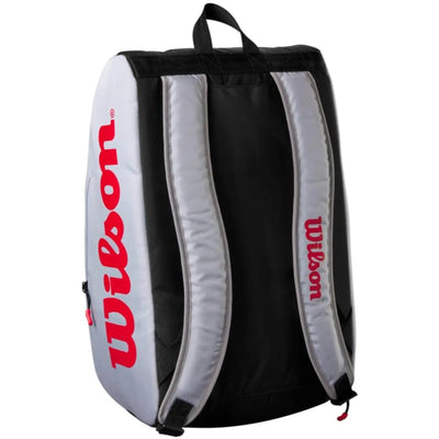 Wilson Super Tour Pickleball Bag in gray, black, and red with padded backpack straps and grab handle.