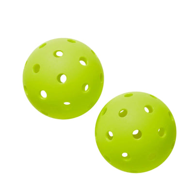 Two bright yellow-green Wilson Tru 32 pickleballs with a 32-hole pattern on a white background.