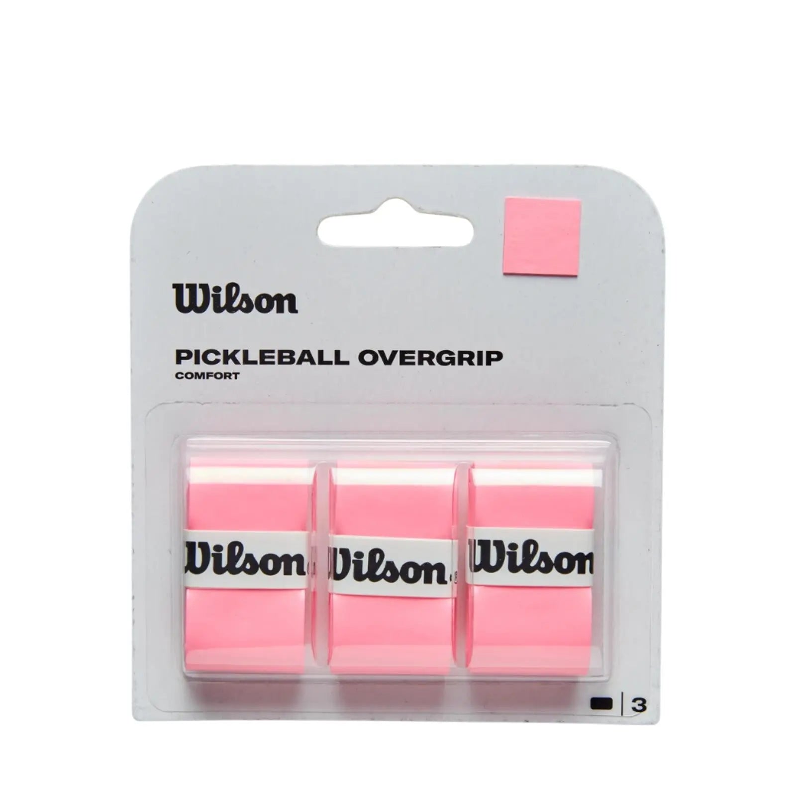 Pack of 3 pink Wilson pickleball overgrips in clear plastic packaging, with a pink color swatch.