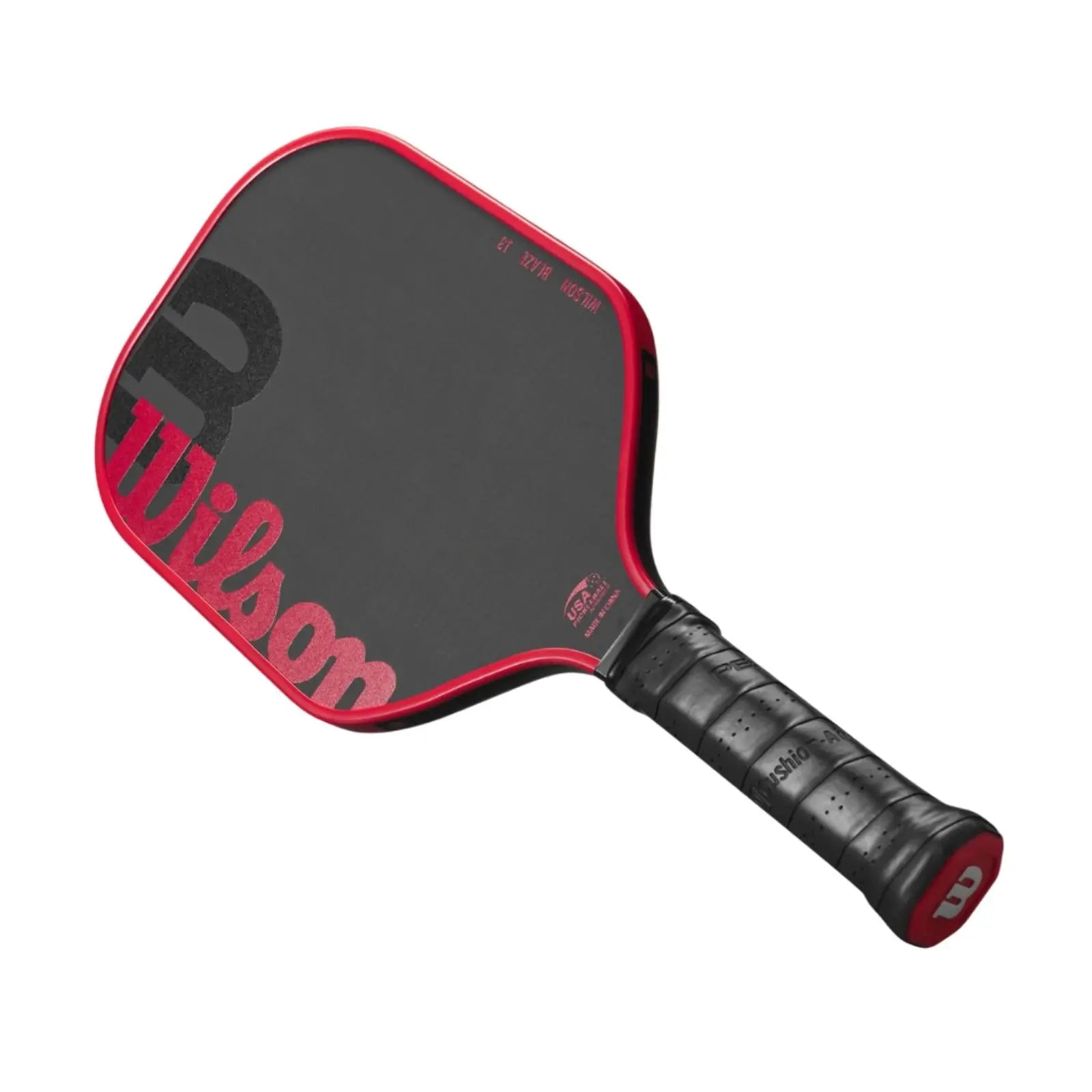 Black Wilson Blaze 13 pickleball paddle with red trim and logo, featuring a black grip.