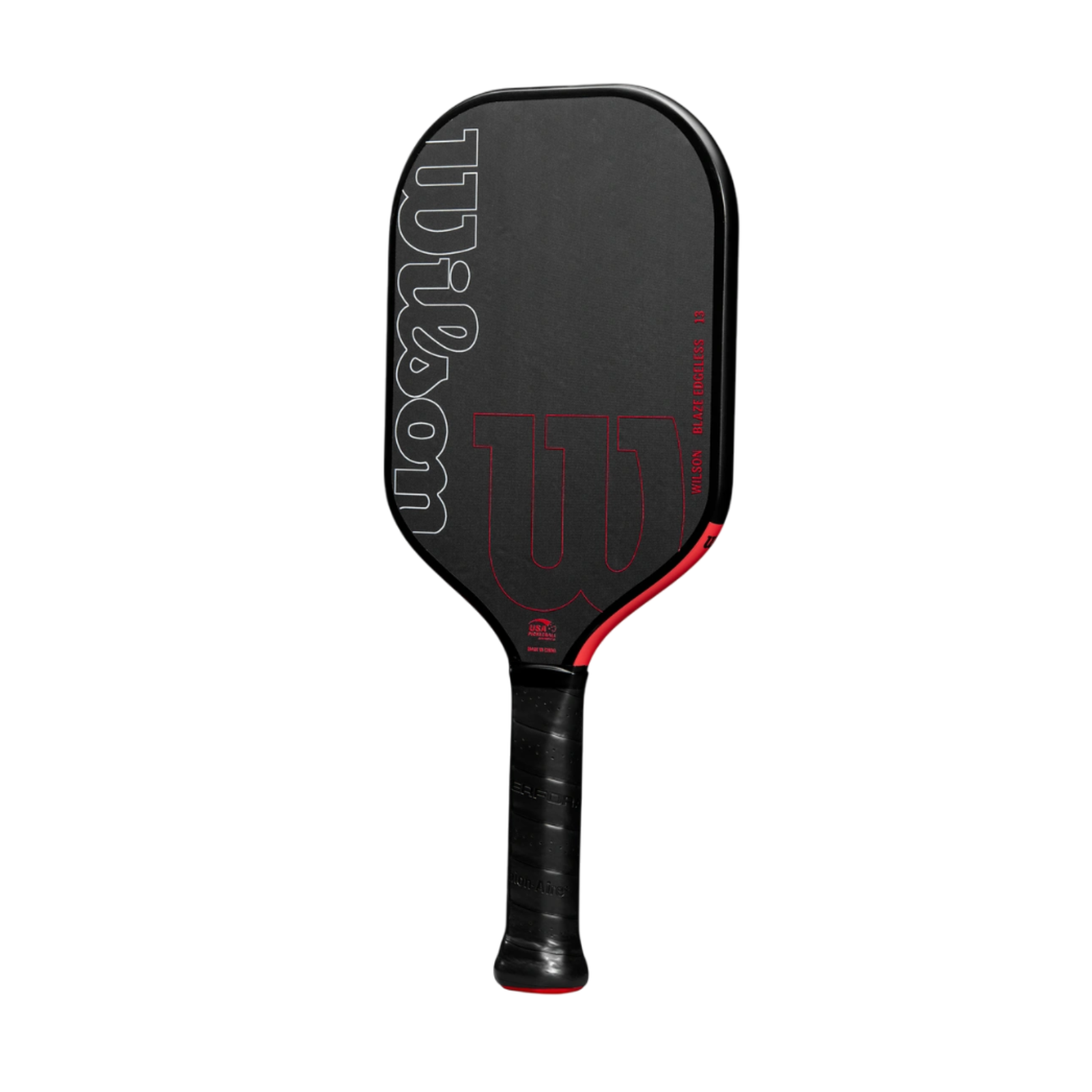 Black Wilson Blaze Edgeless 13 pickleball paddle with red accents, elongated shape, and black grip.