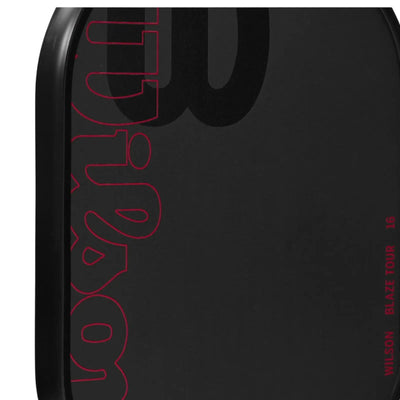 Wilson Blaze Tour 16mm pickleball paddle, black raw carbon fiber with red "Wilson" logo and "Blaze Tour 16" text.