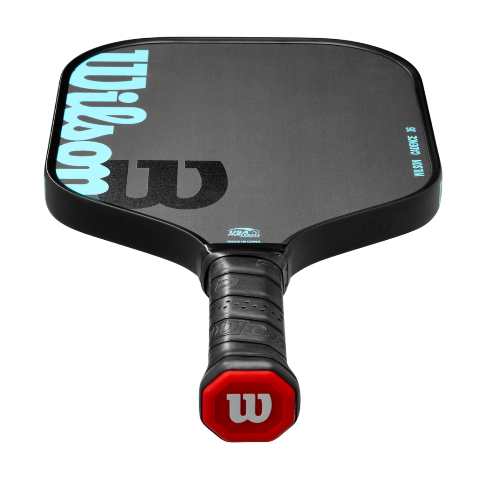 Black Wilson Cadence 16 pickleball paddle with light blue logo, raw carbon face, and red butt cap.