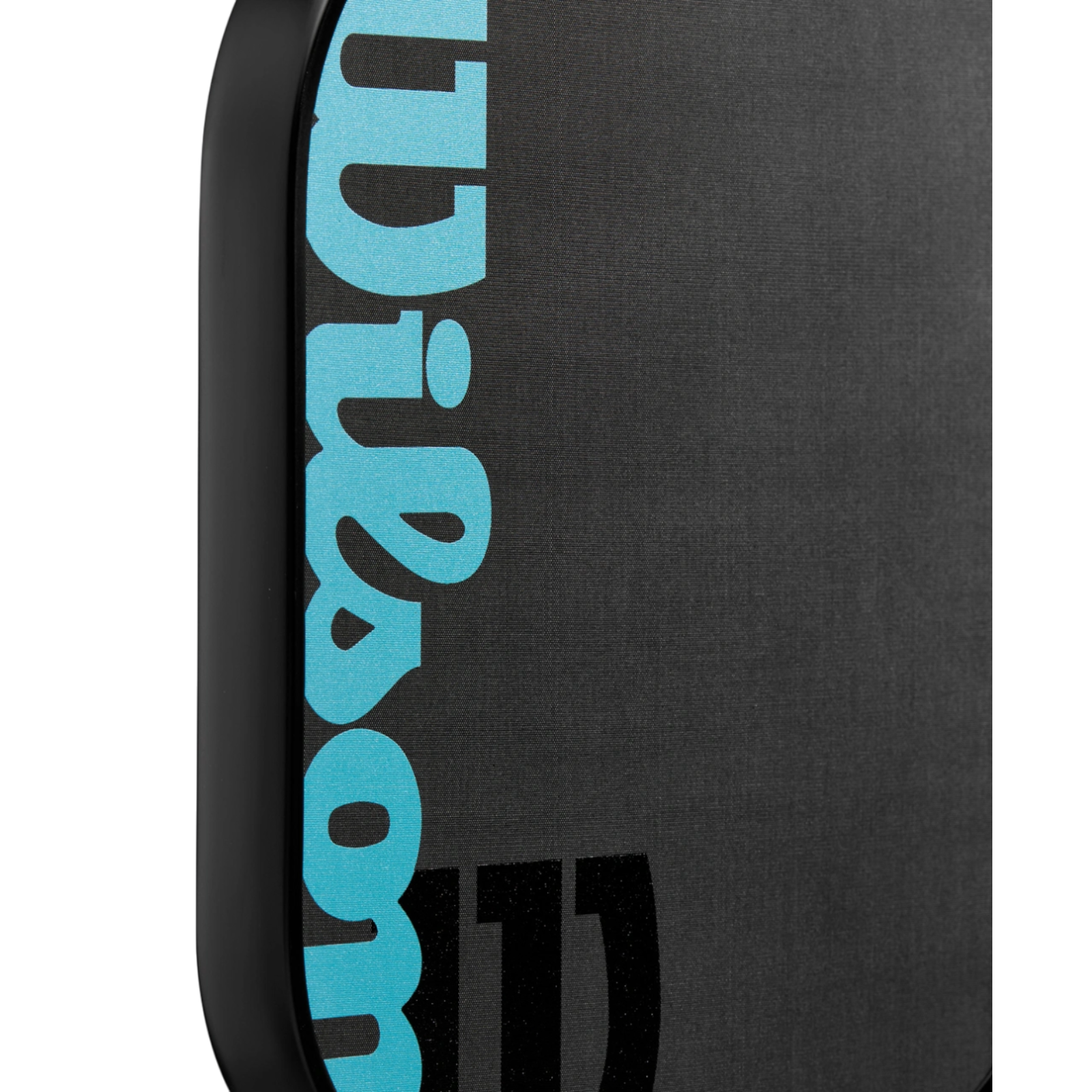 Close-up of the black Wilson Cadence Pro 16mm pickleball paddle with blue Wilson logo.