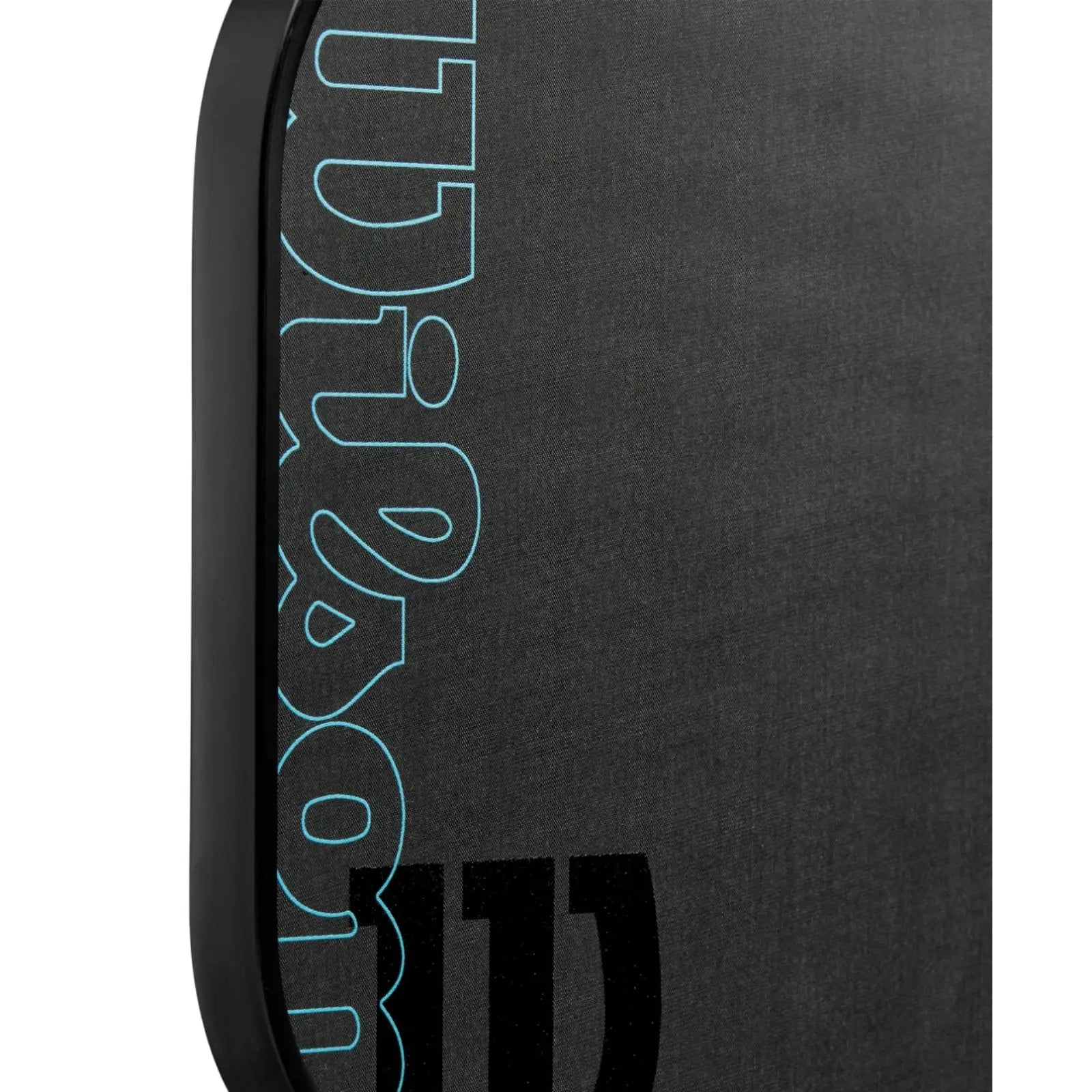 Close-up of a black Wilson Cadence Tour 12mm pickleball paddle with blue outline logo.