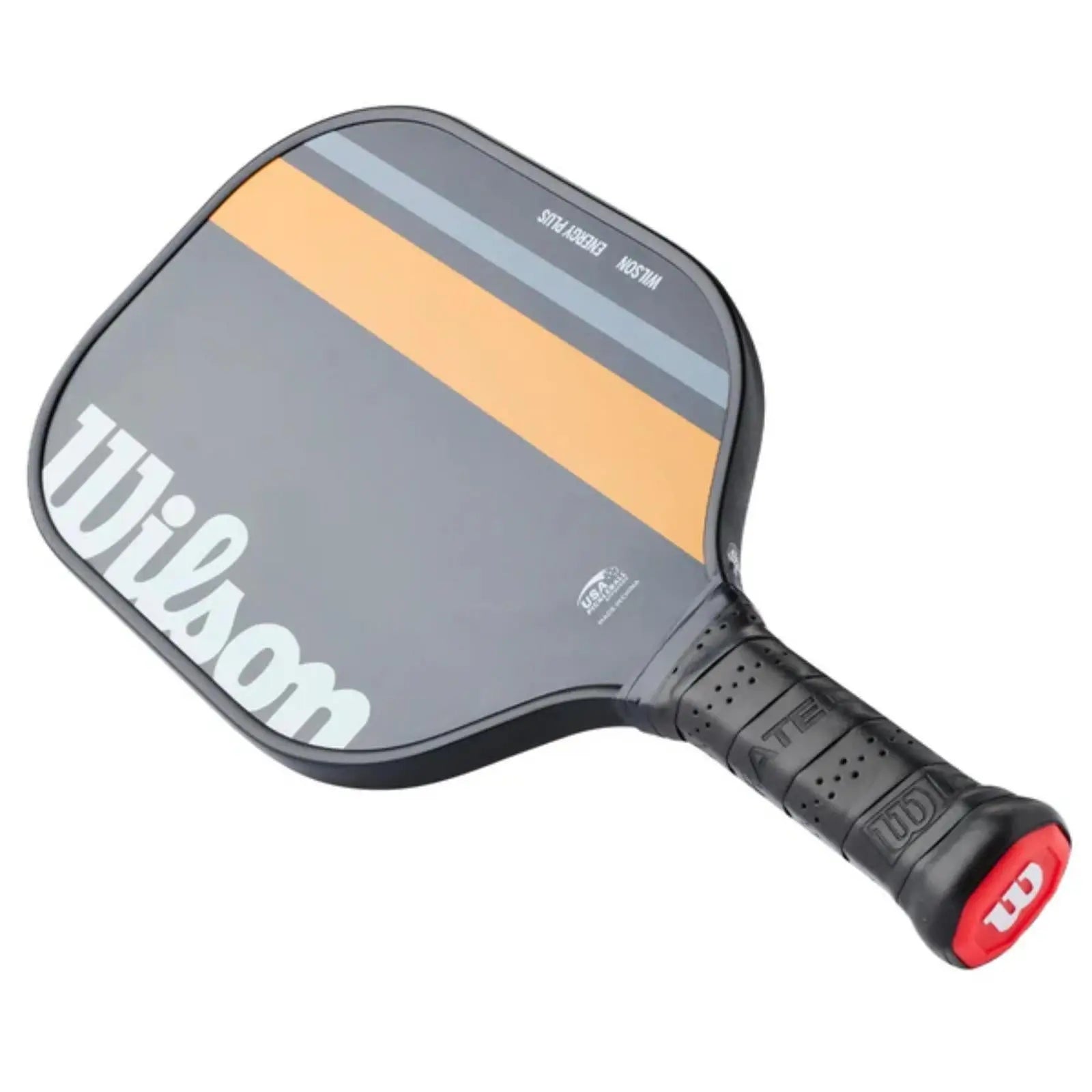 Wilson Energy Plus pickleball paddle with a dark gray face, orange and light gray stripes, and a black grip.