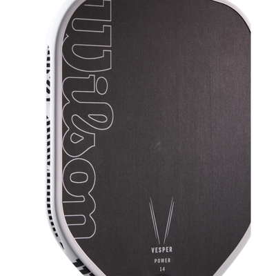 Black Wilson Vesper Power 14 pickleball paddle with white trim and logo, showing raw carbon fiber face.