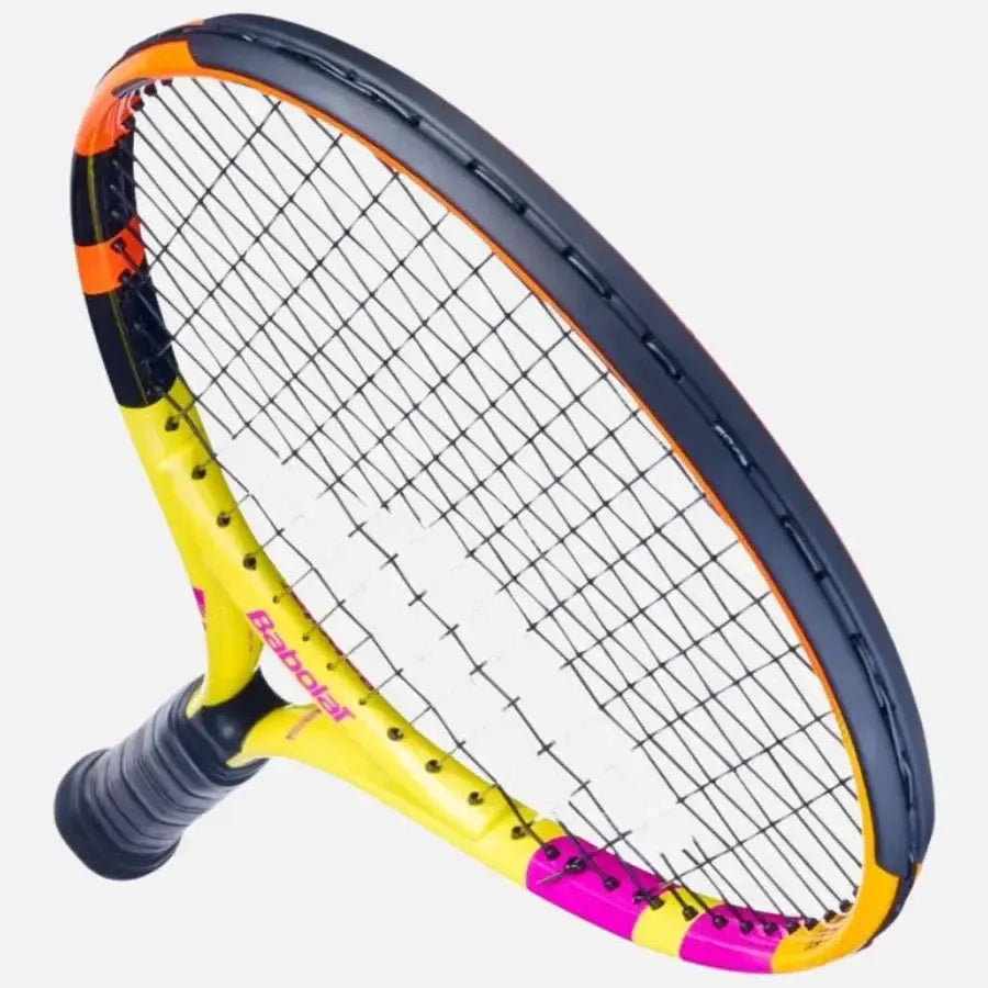 Babolat Nadal Junior 21 tennis racquet, yellow, orange, and pink with black grip and strings.