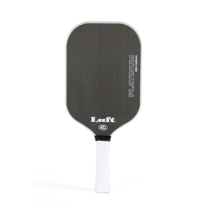 Luft Platinum raw carbon pickleball paddle, elongated, edgeless, with white grip.