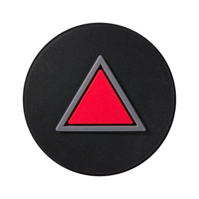 Black circular tennis dampener with a red triangle outlined in gray.
