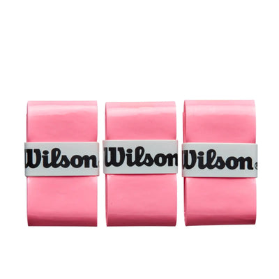 Three rolled pink Wilson pickleball overgrips with white bands and black logos.