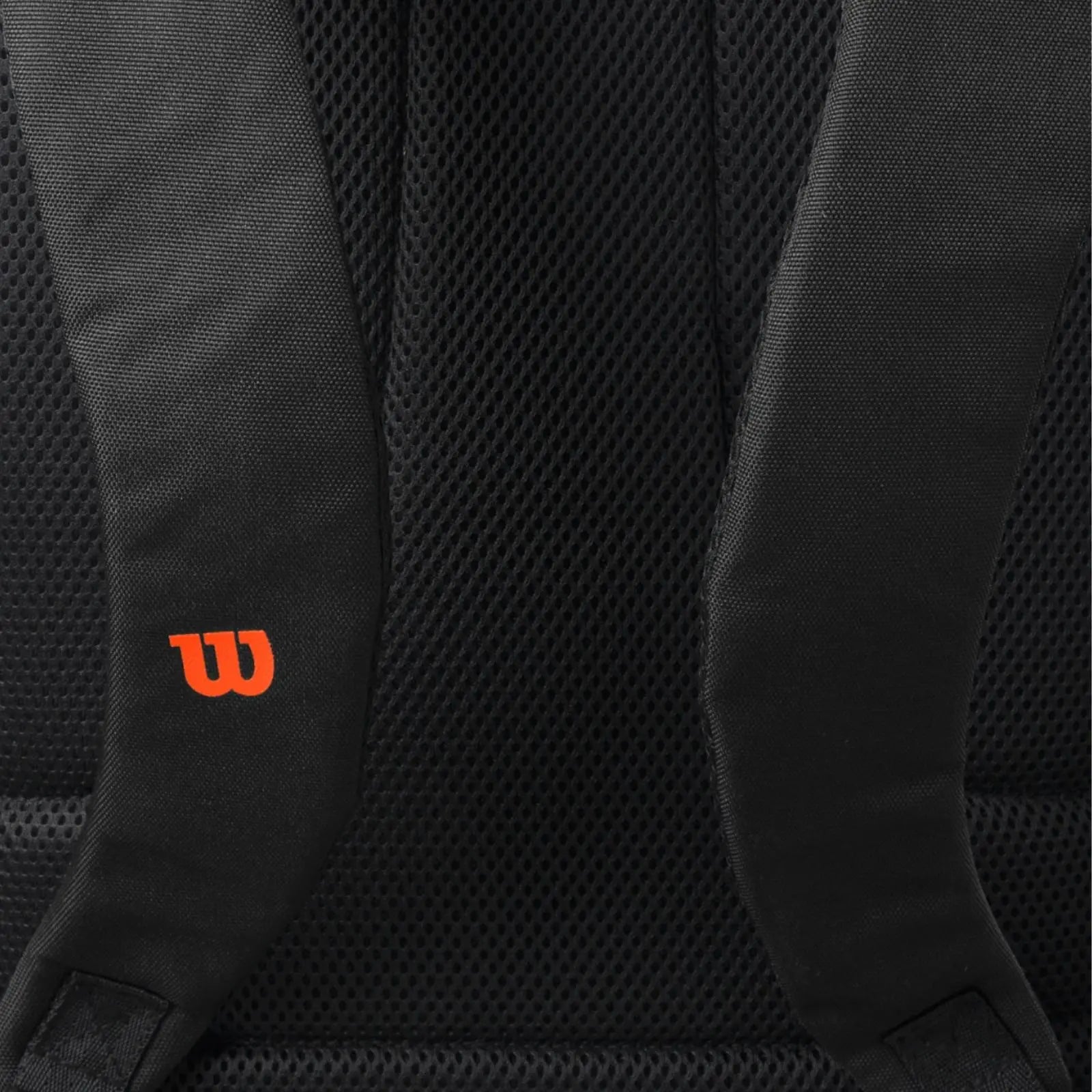 Black Wilson Blade Super Tour tennis backpack back with orange logo and mesh padding.